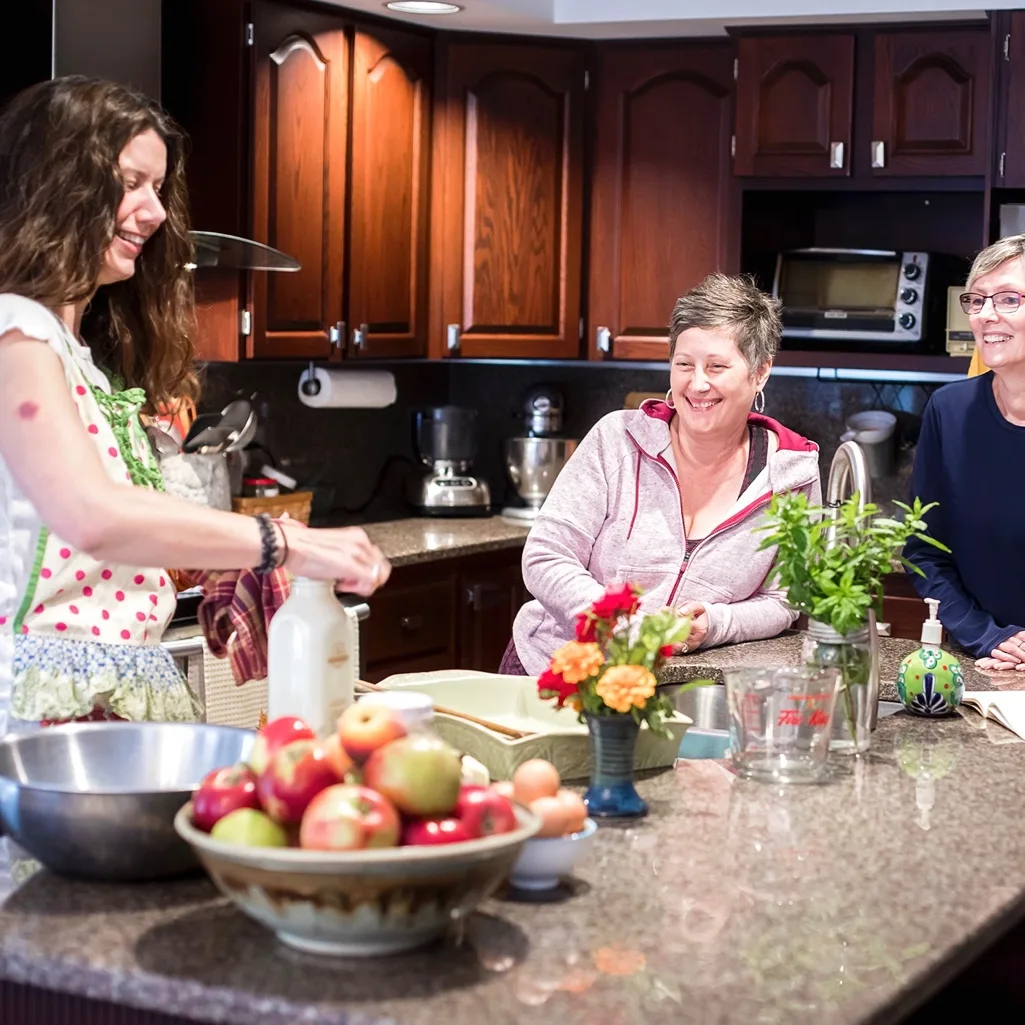 Ayurveda instructor cooking in kitchen