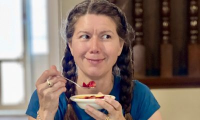 At The Core Teacher Shankari Smiling in a beautiful picture while she eats one of her signatue dishes